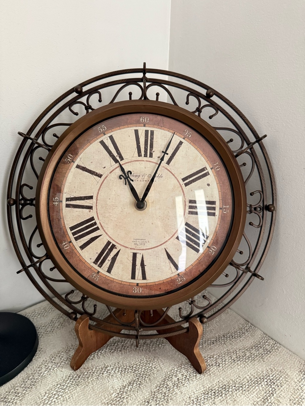 Antique-Style Brown Sterling and Noble Wall Clock with Roman Numerals
